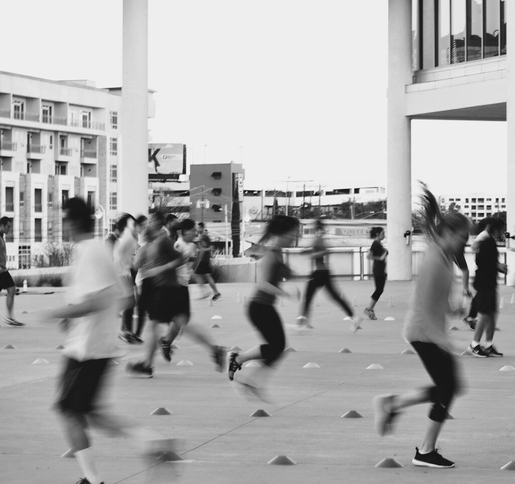 grayscale photography of people at the park